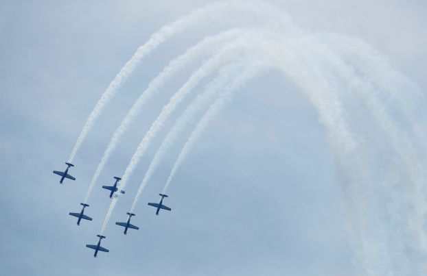 The Indonesian Air Force's aerobatic team performs during celebrations marking the 70th anniversary of the Air Force at Halim Perdanakusuma air base in Jakarta, Indonesia