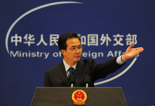 China's Ministry of Foreign Affairs spokesman Hong Lei gestures for questions at a press briefing in Beijing on November 30, 2010. China has urged the United States to "properly handle" issues related to the leaking of secret diplomatic cables through the WikiLeaks website after the leaked cables contained allegations that China turned a blind eye to illicit North Korean missile parts exports and that the top Chinese leadership was behind cyberattacks on US web search giant Google and US targets.  AFP PHOTO / Frederic J. BROWN (Photo credit should read FREDERIC J. BROWN/AFP/Getty Images)